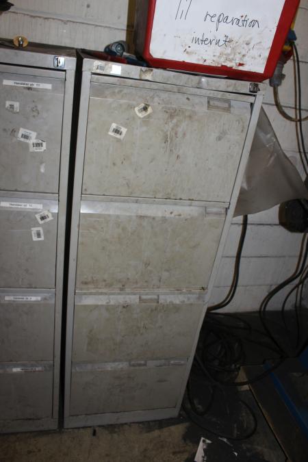 Steel file cabinet with various welding goggles, masks and more.