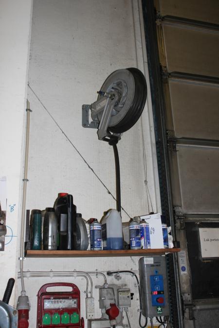 Shelf with various consumables, Air hose reel.