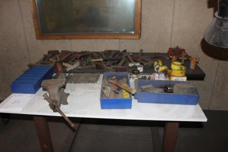 Various tools, cutting tools, etc. on table.