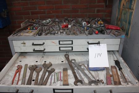 Trash section with contents of various tools and more.