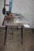 Work table with various spiral drill bits, 2 piece welders etc.