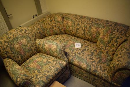 Antique and flowered sofa and armchair