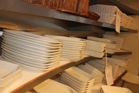 Shelf with about 35 refractory dishes.