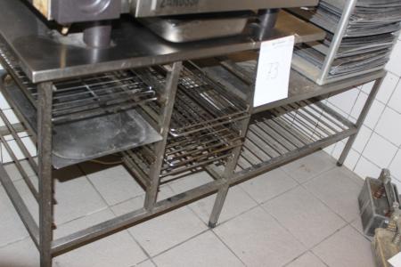 Stainless steel table with recessed stand.