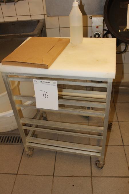 Rolling table with spanking board