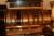 Reol med messingbånd, rustfrit bord (ældre pengeautomat medfølger ikke) længde 300 cm højde 200 cm med led lys med mere.