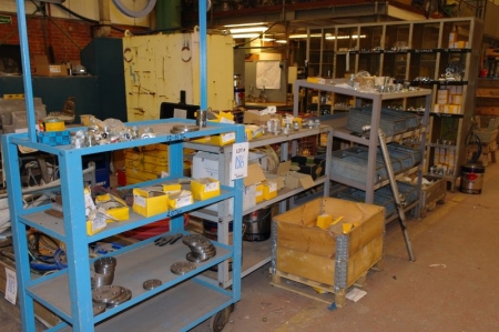(2) roll racks with various tube fittings + half pallet on floor with tube fittings + assembly rack with tube fittings + (2) pallets on floor with tube fittings + steel rack with tube fittings
