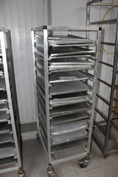 Stack of shelves with stainless steel plates.