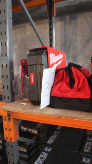 Milwaukee Tool Set Unused, cordless screwdriver lamp + 2 batteries and charger.