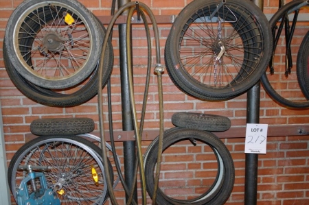 Bicycle rims and tyres on wall