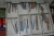 Tool cabinet + rack with large quantity of threading tools and socket spanners
