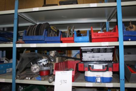 Various head drill bits, cutting discs with more on 2 shelves.