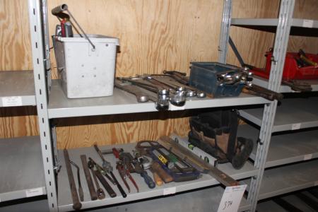 Various hand tools on 2 shelves.