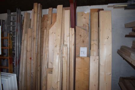 Various wood along the wall, reglar, rafters, etc.