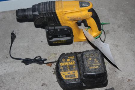 A hammer drill with charger + spare battery