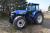 New Holland TM 130, årg. 2003, timer 5151, 4 wd, frontlift, front pto, aircon., 20% dæk