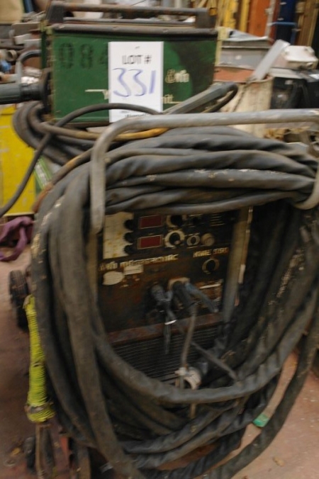 Migatronic KMX 550 + wire feed unit, Migatronic Yard Unit KT 62-4 4WD + cables. Wheeled frame