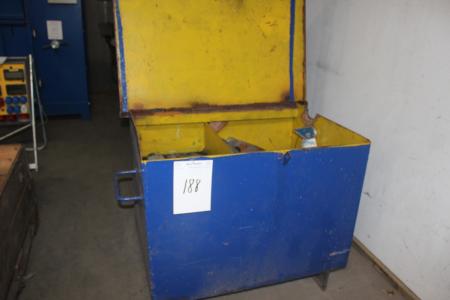 Steel box on wheels with welding parts.