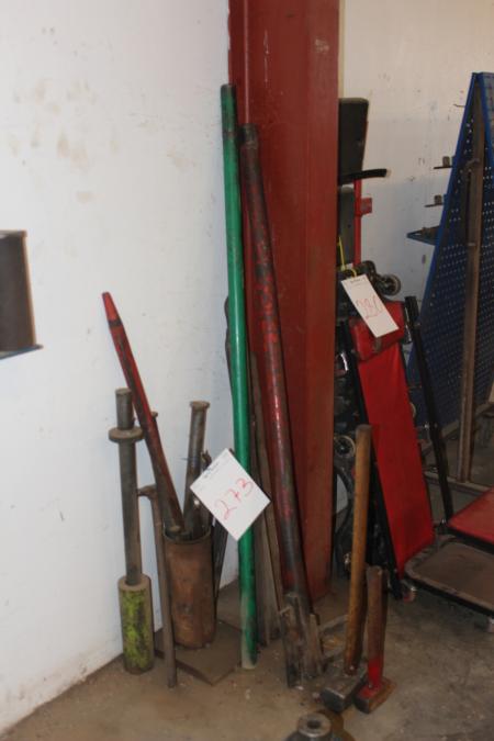 Various set up tools pole bars and more in the corner