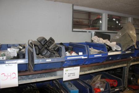 Various tractor spare parts in 8 assortment boxes.