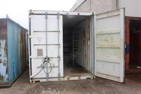 20 foot ship container, I ok stood with electricity, light and file bench.