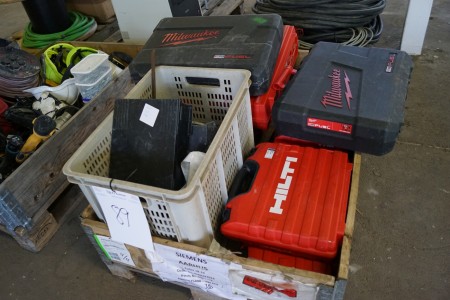 Lot of empty power tools boxes.