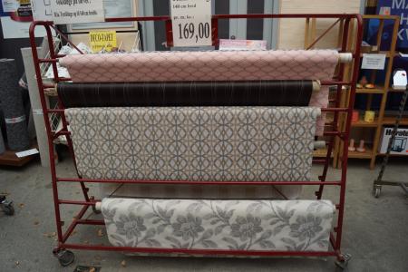 Rolling rack with textile curtain fabric.