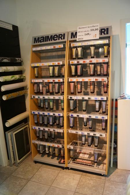 Exhibition rack with Maimeri Acrylic color including shelf with wallpaper.