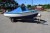 15 foot boat with Yamaha 15 hp motor, cover, console, etc. approximately 10 years old