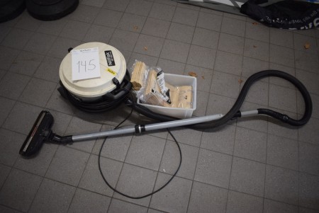 Industrial Vacuum Cleaner marked. Nilfisk GD 930 with extra bags