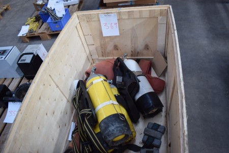 Various diving equipment with bottles.