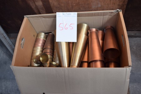 Various copper and brass pots.