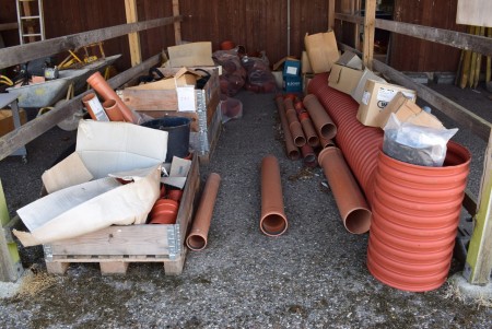 Miscellaneous sewer pipes, bends in different sizes.