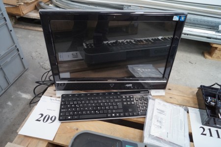 PC monitor with built-in computer and windows 7 keyboard marked. Medion