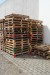 Various Euro pallets in the yard.