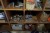 Contents in bookcase, miscellaneous fittings, hoses and more