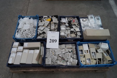Pallet with various electrical appliances, sockets, frames, sockets, etc.