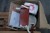 Box of mixed household things, bread cutter, plates, toaster etc.