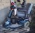 Three-wheeled electric moped with charger, not tested, mark Apollo 666