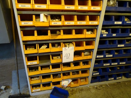 2 shelves with assortment boxes containing various spare parts