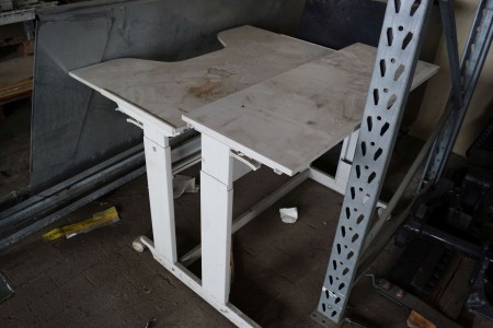 2 pieces of rolling table. Adjustable height