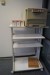 Desk, side table with typewriter + 2 roll drawer section + 3 pcs. jealousy shelving