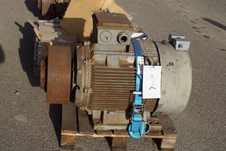 Large electric motor with pulleys