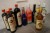 11 bottles of spirits: 3 x Fish 0.7 L, 1 x Fish 1 L, 1 x Bols 0.5 L, 1 x Small Sour 1 L, 1 x Gordon Gin 0.7 L, 1 x Baylies 0.7, 1 x Captain Morgan Room 0.7 L, 2 x Bacardi Room 0.7 L