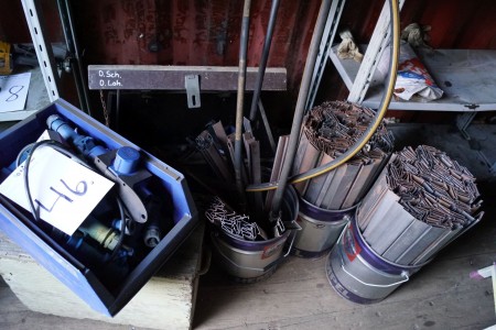 Power plug, toolbox containing iron iron.