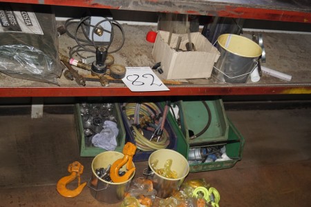 Contents on shelf and floor, hooks, manometer and more.