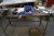 Værkstedsbord med 2 stk. skruestik, uden indhold L: 200 H: 89 D: 59 cm.
