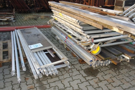 (2) pallets with (2) moveable tower scaffolding. Length = 2.4 m x width = 1.33 m. Instant Span. Max. loading: 2KN/m2