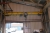 Lean-to-roof; app. 6 x 12 meter. Exhaust. Gantry crane with electric hoist, 200 kg. Steel plate: app. 3 x 3 meter.