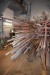 Large piece of iron flat iron, square pipe, stainless steel and more. + 6 fag rack and shelving rack.